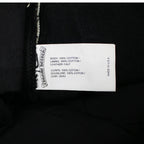 Chrome Hearts jeans with green and leopard cross patches