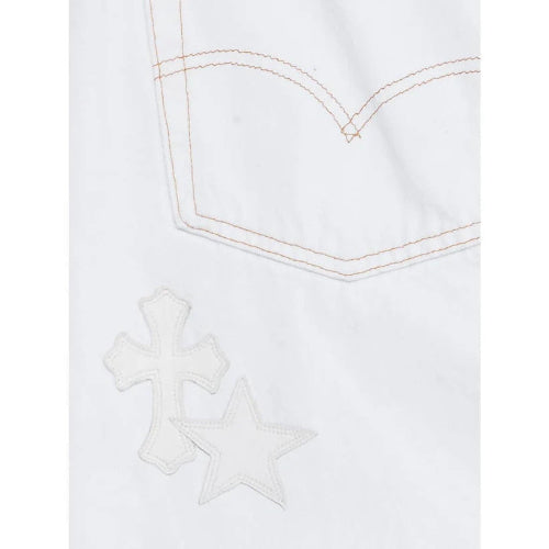 closeup view of Chrome Hearts x Levi’s St. Barths jeans